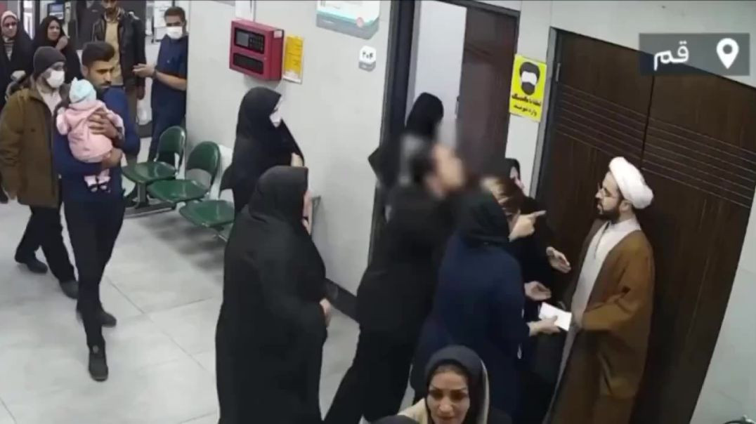 ⁣Brave Iranian Woman confronts a mullah who filmed her for not wearing compulsory veil in hospital